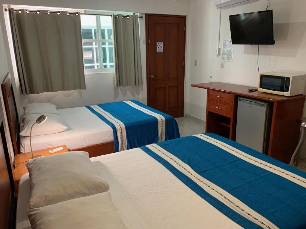Deluxe Quadruple Room room - Image 1