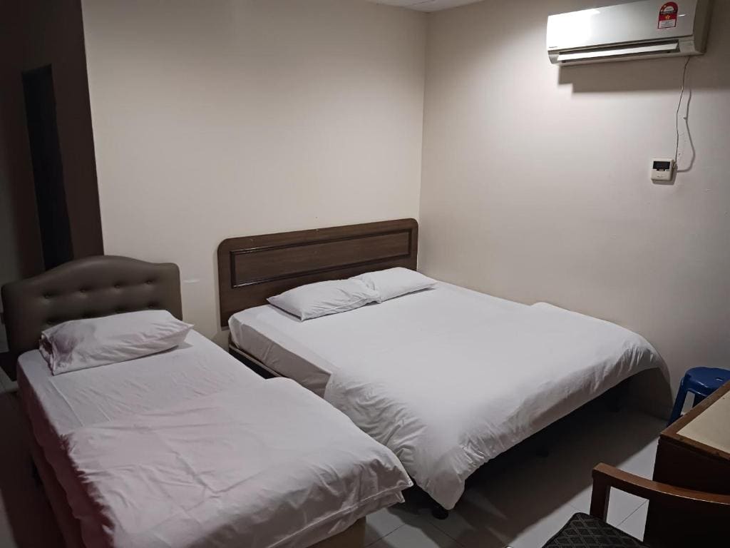 Deluxe Triple Room room - Image 1