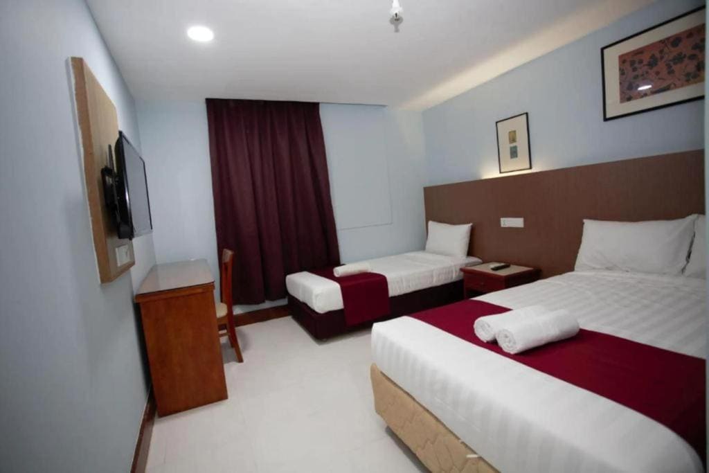 Deluxe Triple Room room - Image 1
