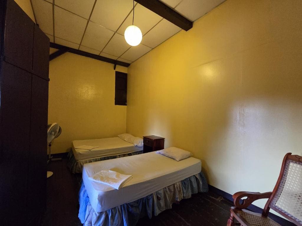 Economy Triple Room with Shared Bathroom room - Image 1