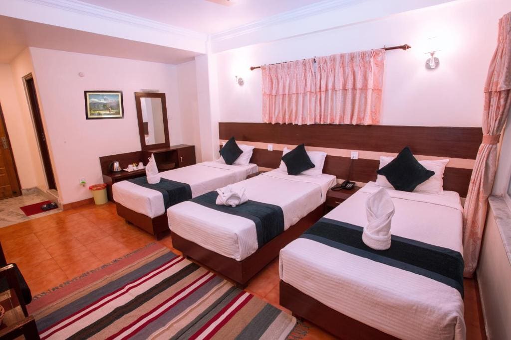 Deluxe Triple Room room - Image 1