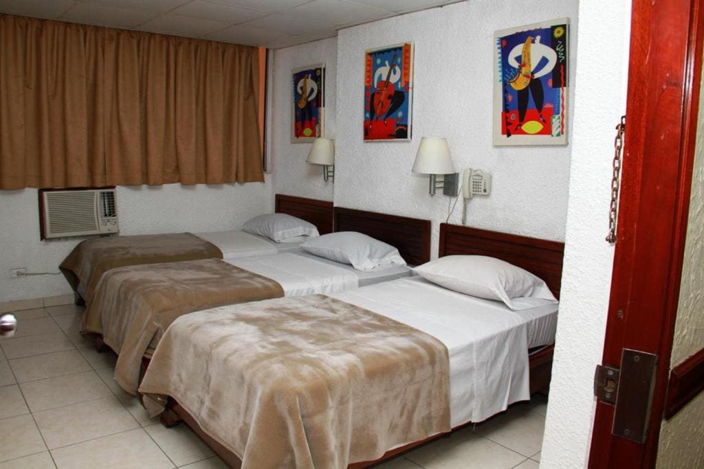Deluxe Triple Room room - Image 1