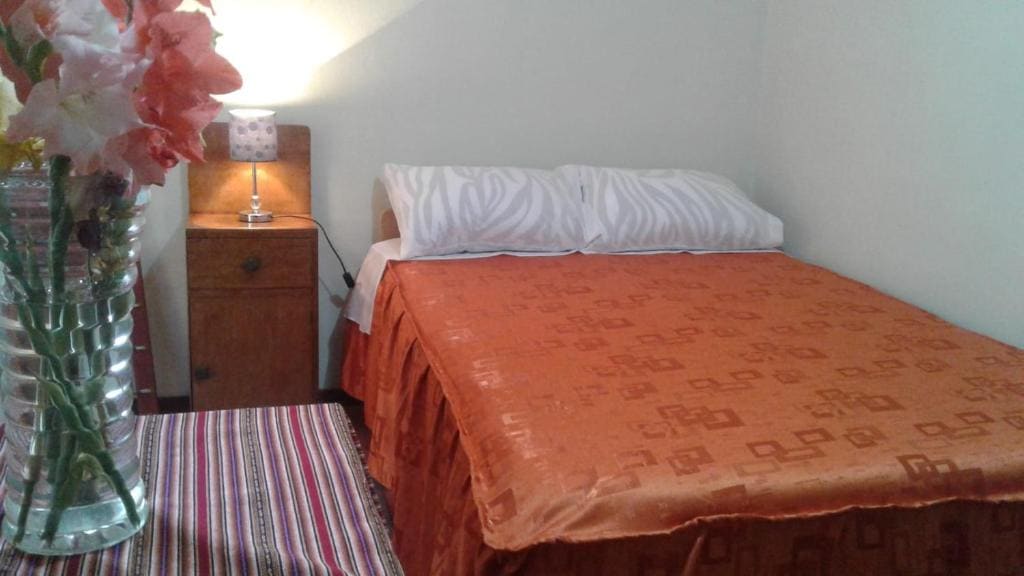 Basic Triple Room with Shared Bathroom room - Image 1