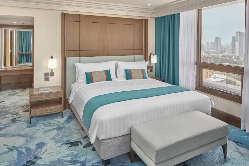 Premium Queen Room with Two Queen Beds room - Image 2