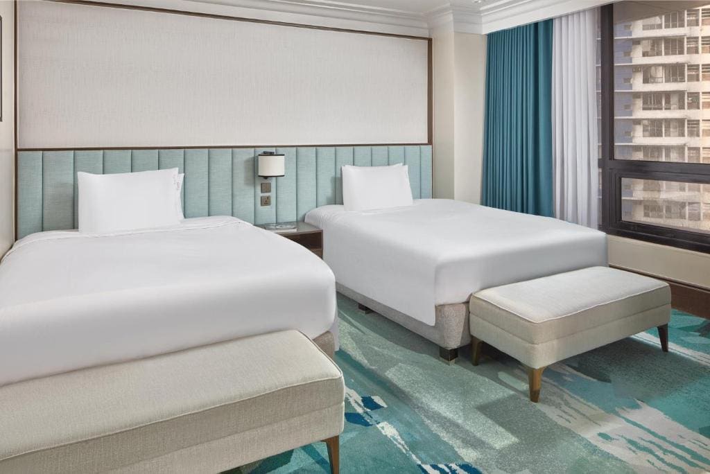 Premium Queen Room with Two Queen Beds room - Image 1