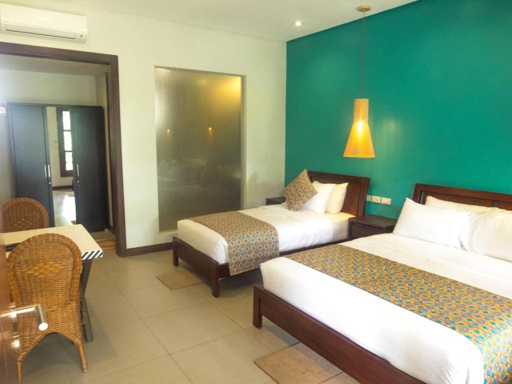 Deluxe Triple Room room - Image 1