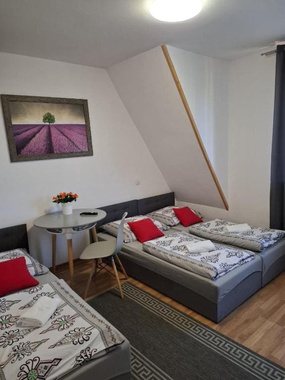 Quadruple Room with Private Bathroom room - Image 1