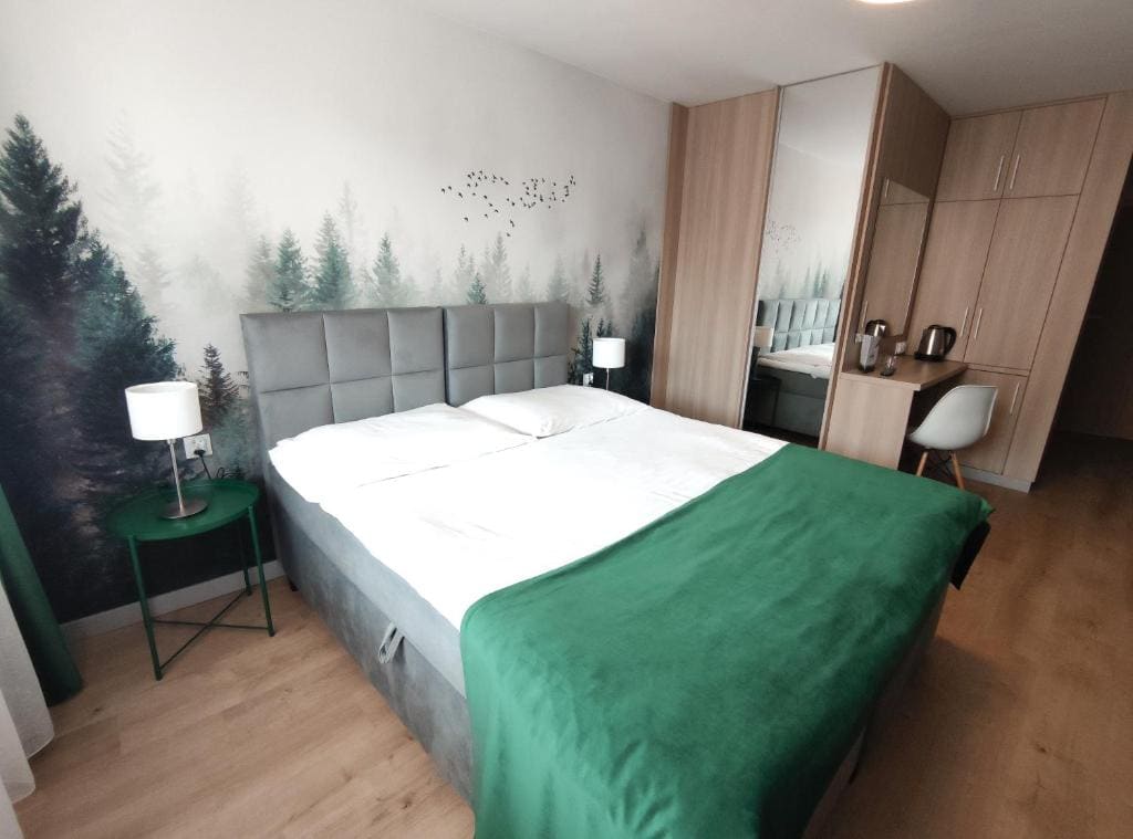 Deluxe Quadruple Room room - Image 2
