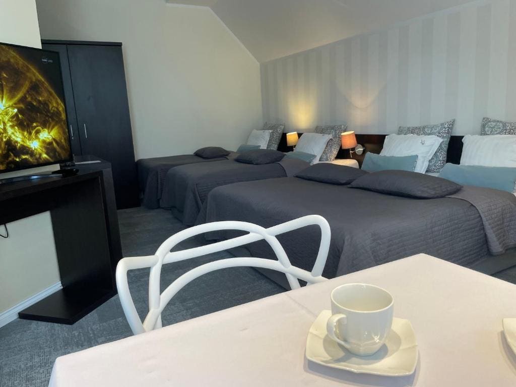 Quadruple Room with Kitchenette room - Image 1
