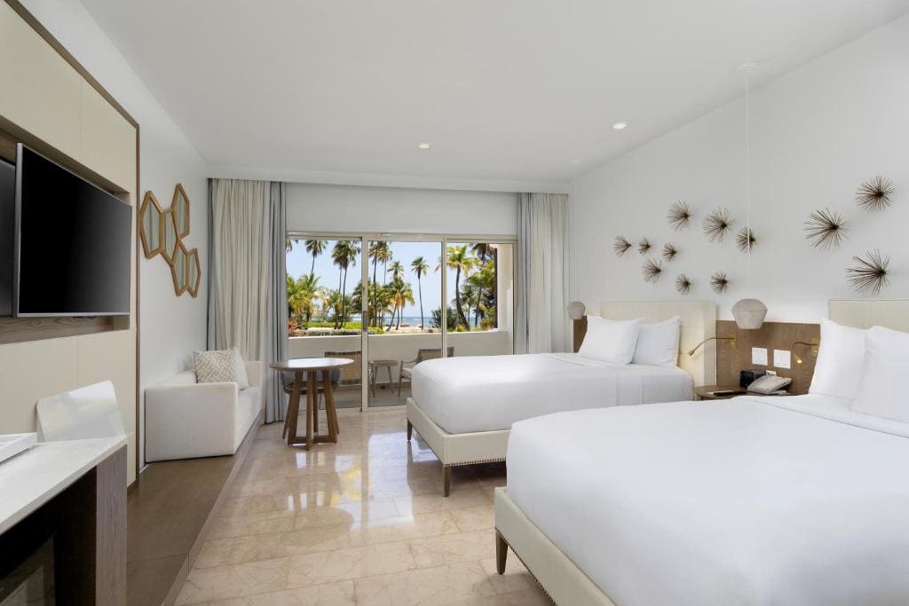 Double Room with Two Double Beds and Ocean View room - Image 2