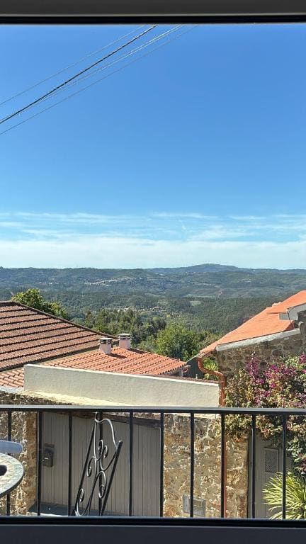 One-Bedroom Apartment with Balcony and Mountain View room - Image 1