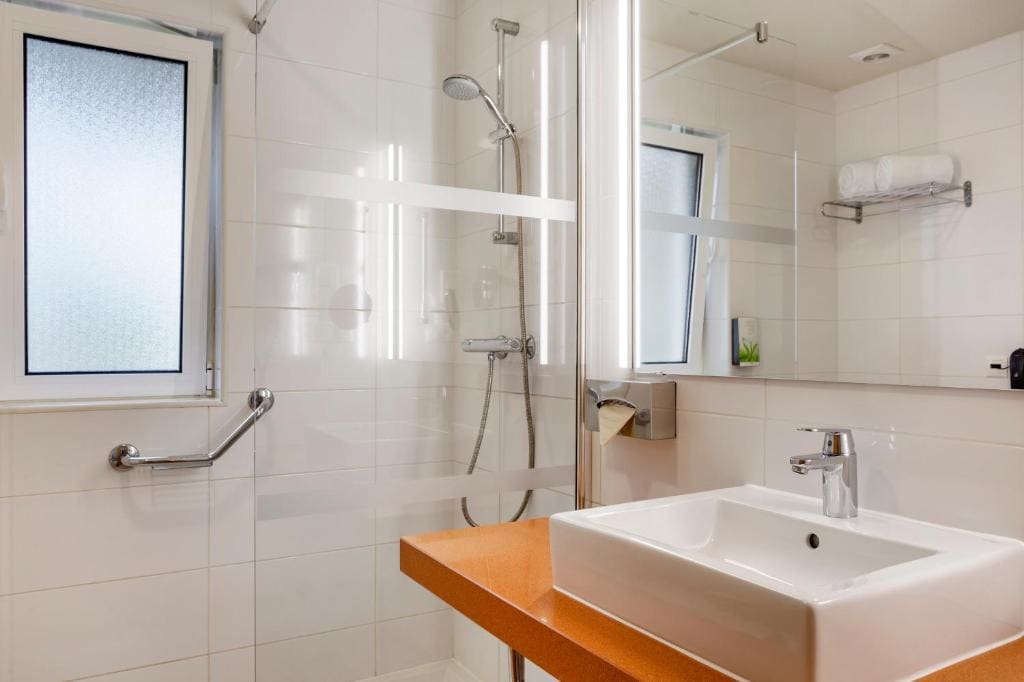Premium One-Bedroom Apartment room - Image 3