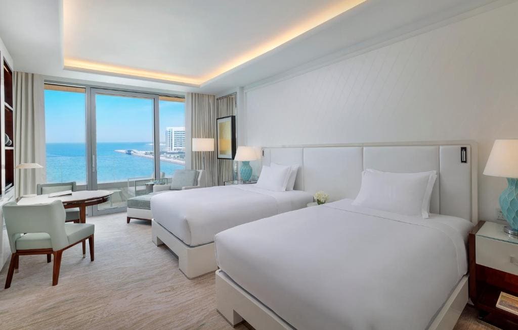 Deluxe Queen Room with Two Queen Beds and Sea View room - Image 1