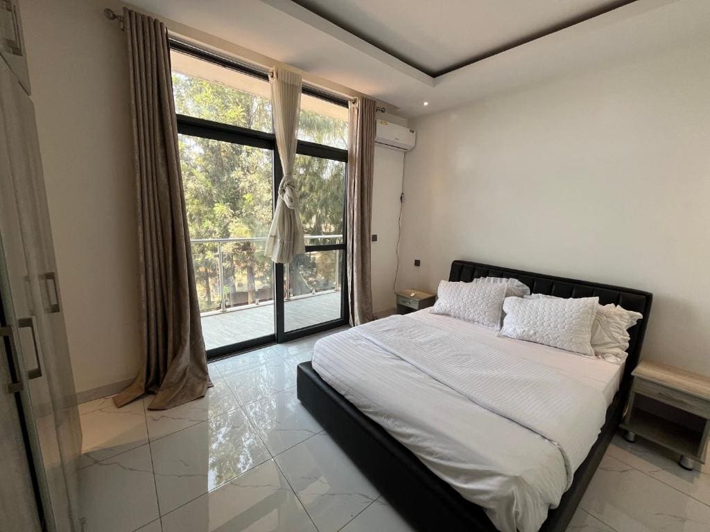 Three-Bedroom Apartment room - Image 3