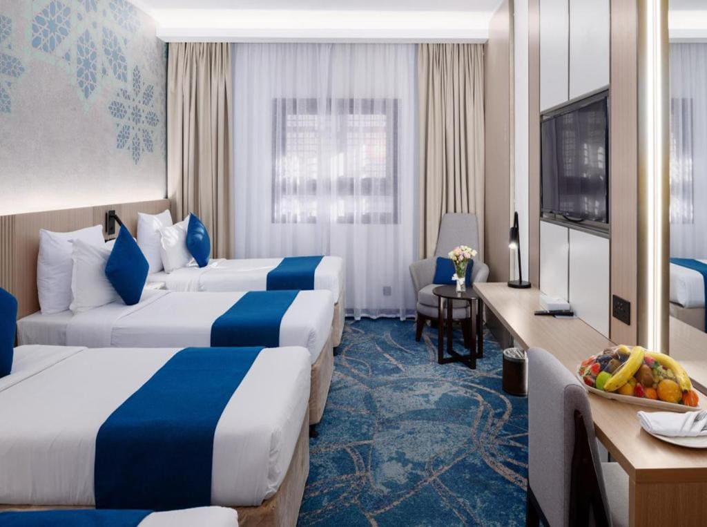 Deluxe Quadruple Room room - Image 2
