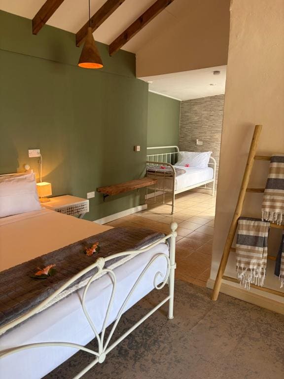 Deluxe Double Room (2 Adults + 1 Child) room - Image 3