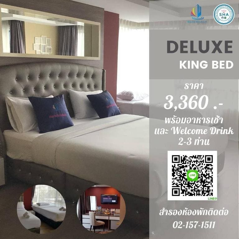 Deluxe King Bed 1 Single Bed room - Image 2