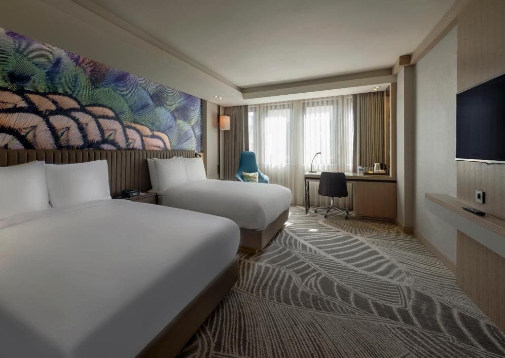 Deluxe Queen Room with Two Queen Beds room - Image 2
