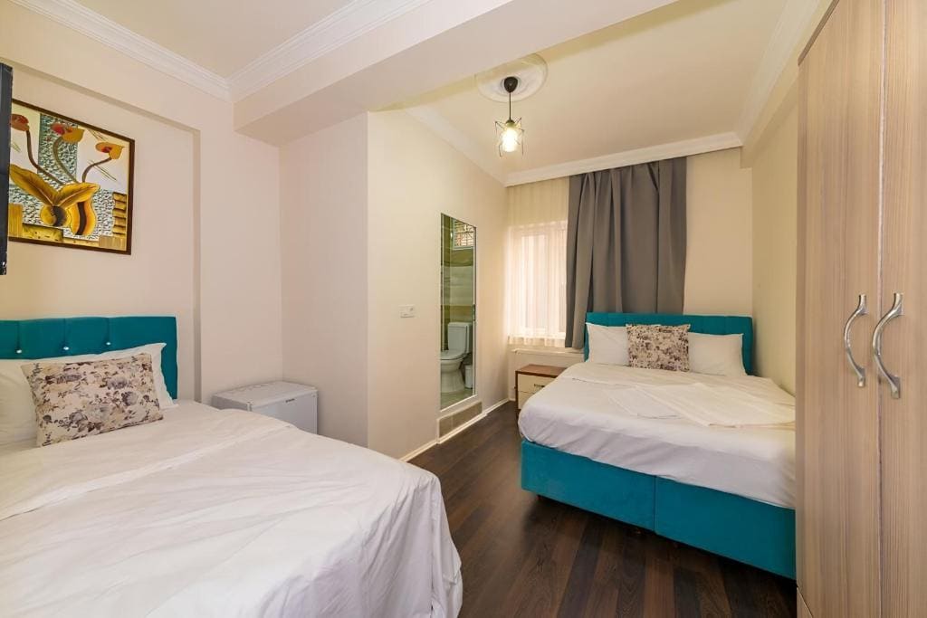 Deluxe Triple Room room - Image 1
