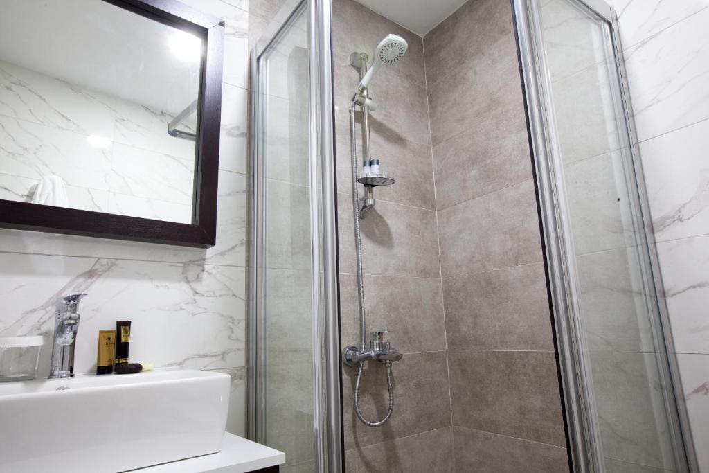 Double Room with Balcony (2 Adults + 1 Child) room - Image 2