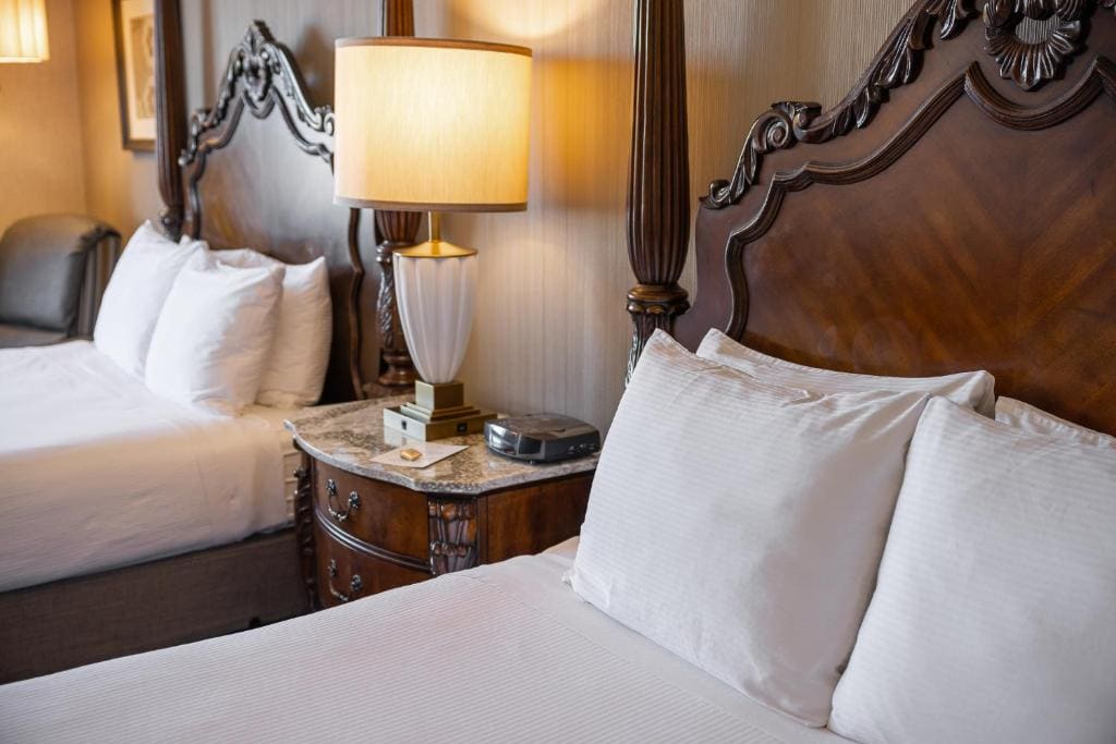 Deluxe Queen Room with Two Queen Beds room - Image 2
