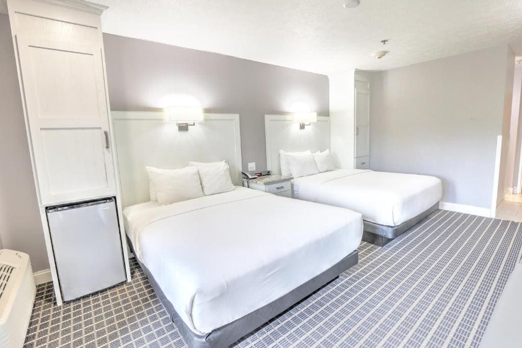 Deluxe Queen Room with Two Queen Beds room - Image 2