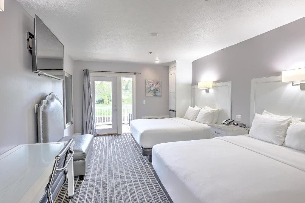 Deluxe Queen Room with Two Queen Beds room - Image 1