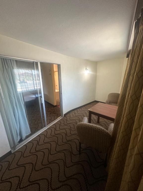 Suite with Three Queen beds room - Image 2