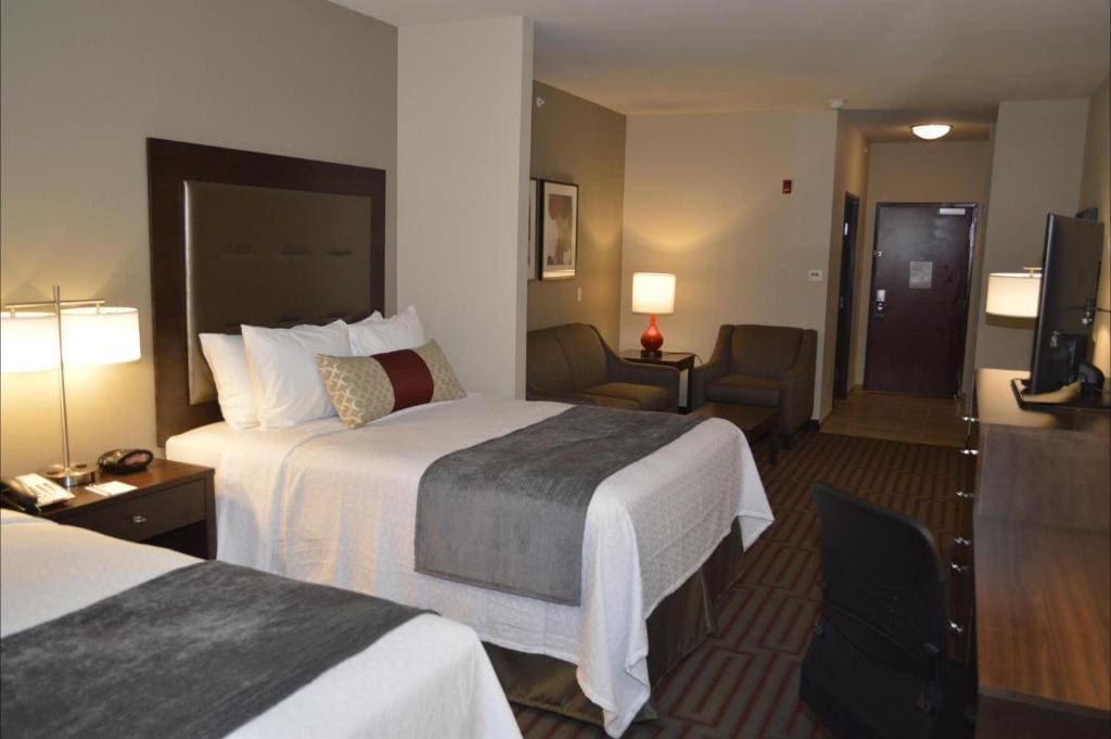 Queen Suite with Two Queen Beds and Sofa Bed room - Image 2