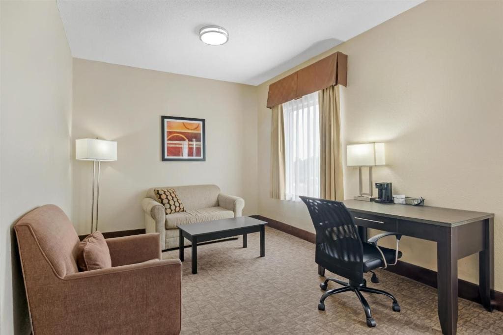 Queen Suite with Two Queen Beds and Sofa Bed room - Image 3