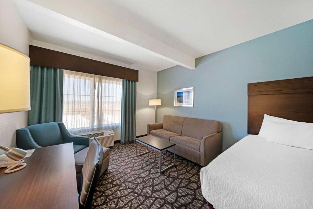 Queen Room with Two Queen Beds and Sofa Bed room - Image 1