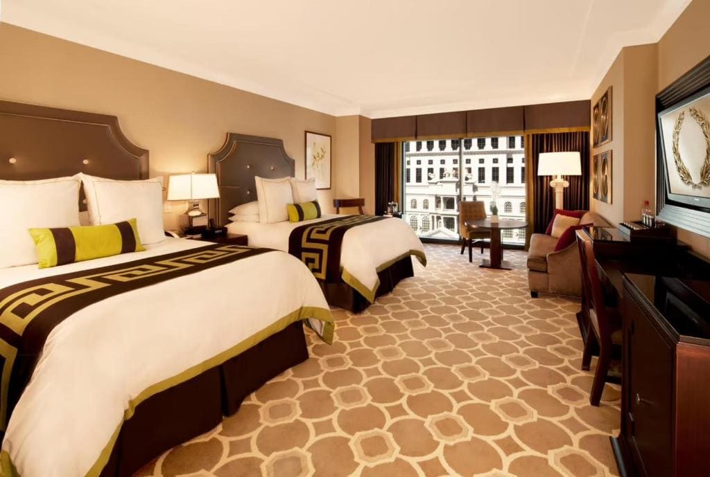 Octavius Premium Suite 1 King Bed + 2 Queen Bedroom room - Image 2