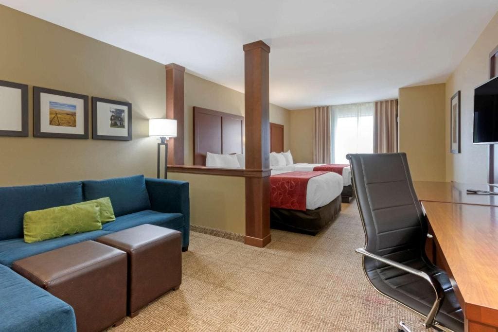 Queen Suite with Two Queen Beds and Sofa Bed room - Image 2