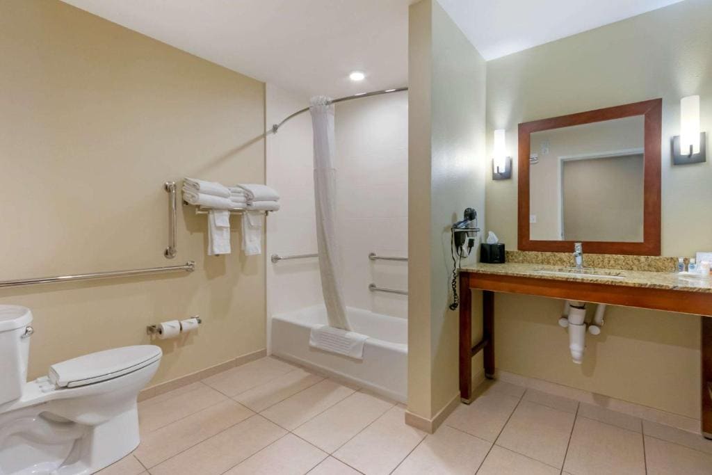 Queen Suite with Two Queen Beds and Sofa Bed room - Image 3