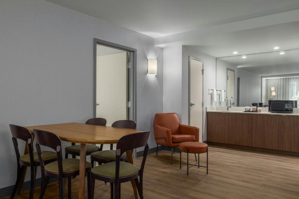 One-Bedroom Queen Suite with Two Queen Beds and Sofa Bed room - Image 3