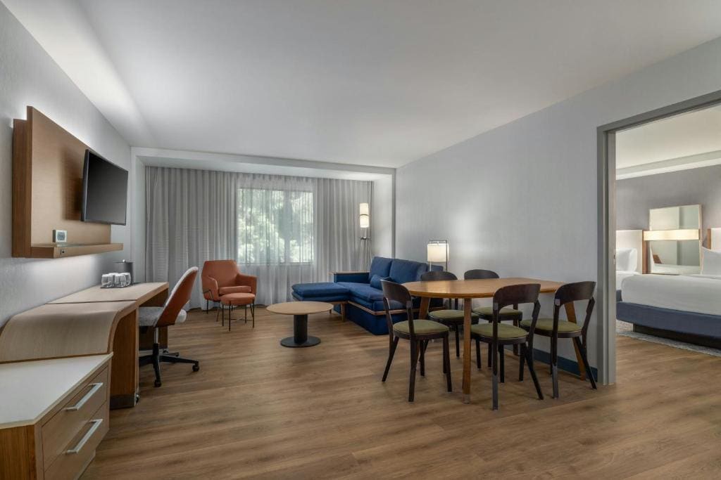 One-Bedroom Queen Suite with Two Queen Beds and Sofa Bed room - Image 1