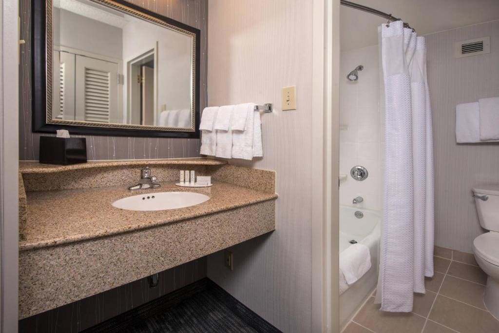 Suite with Two Double Beds and Sofa Bed room - Image 1