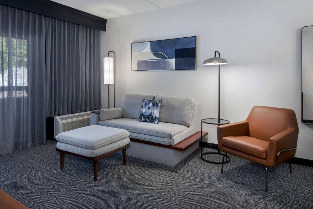 One-Bedroom Suite with Two Double Beds and Sofa Bed room - Image 1