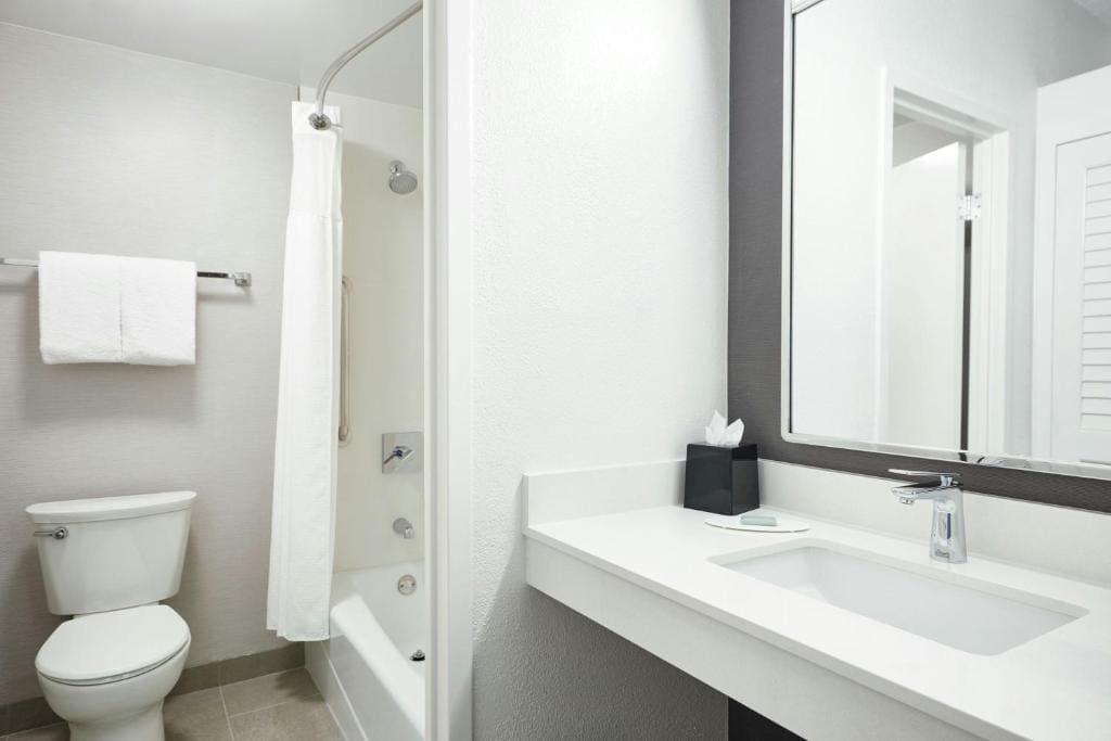 One-Bedroom Suite with Two Queen Beds and Sofa Bed room - Image 2