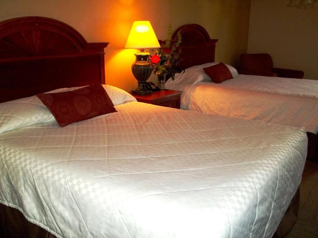 Queen Room with Two Queen Beds - Exterior Second Floor room - Image 1