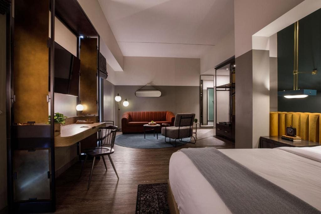 One-Bedroom Corner King Suite with Sofa Bed room - Image 1