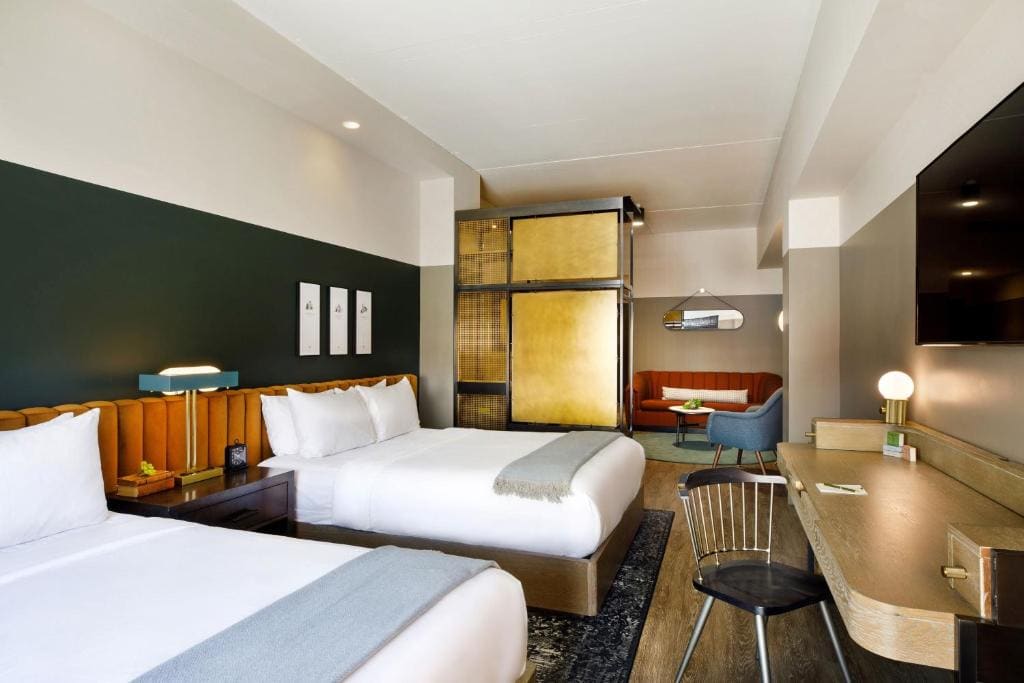 Deluxe Queen Room with Two Queen Beds room - Image 1