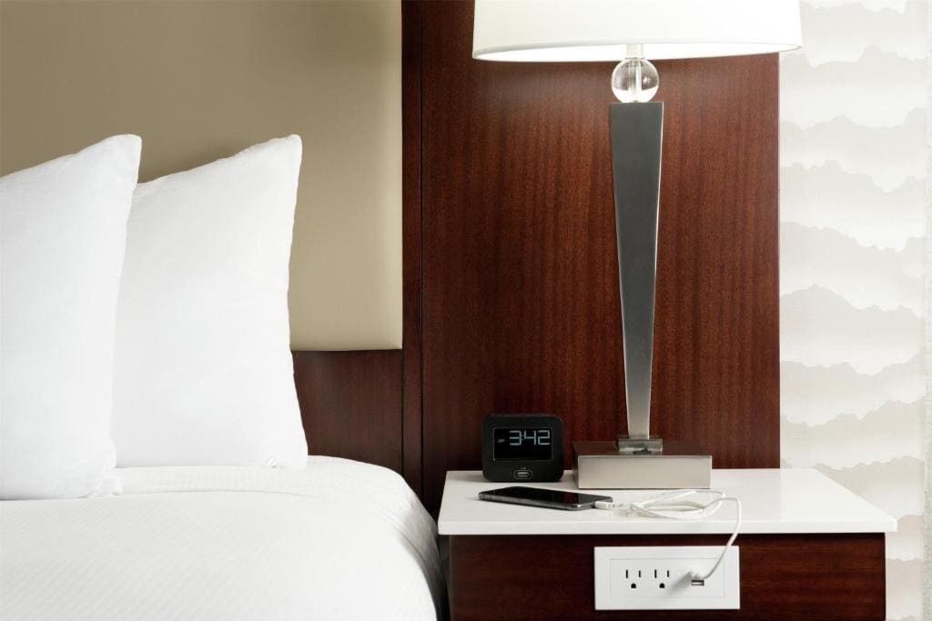 Deluxe Queen Suite with Two Queen Beds and Sofa Sleeper - Living Room room - Image 3