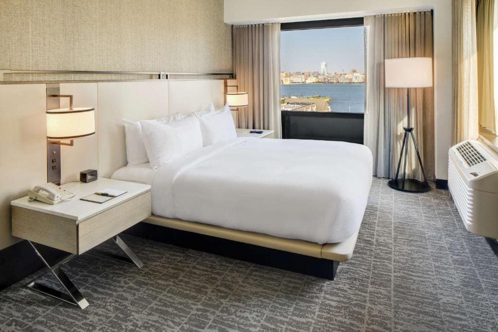 Corner Junior King Suite with Sofa Bed room - Image 1