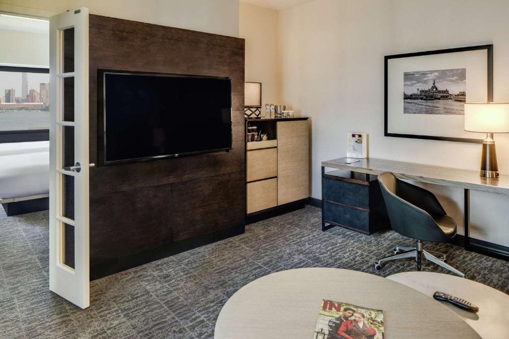 One-Bedroom Corner King Suite with Sofa Bed room - Image 1