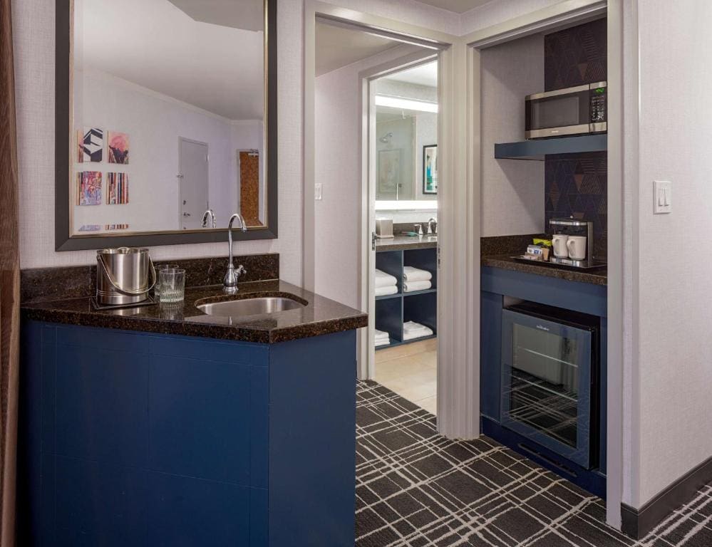 One-Bedroom Corner Queen Suite with Sofa Bed room - Image 2
