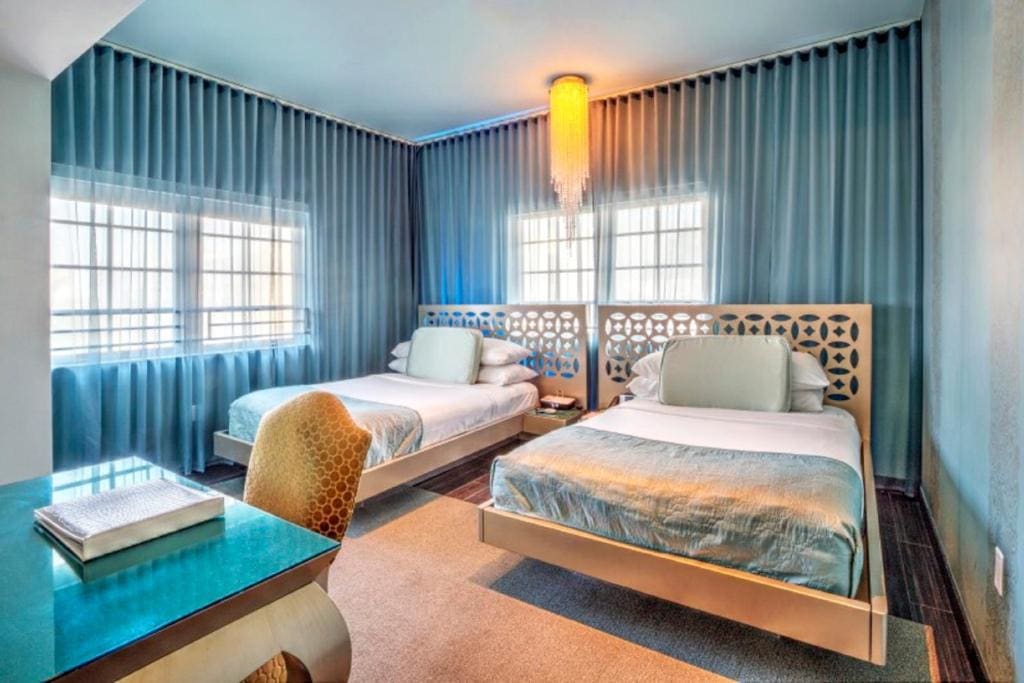 Double Room with Two Double Beds and Roll-In Shower room - Image 1