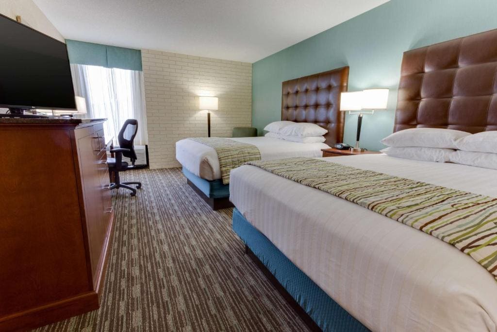Deluxe Queen Room with Two Queen Beds room - Image 1