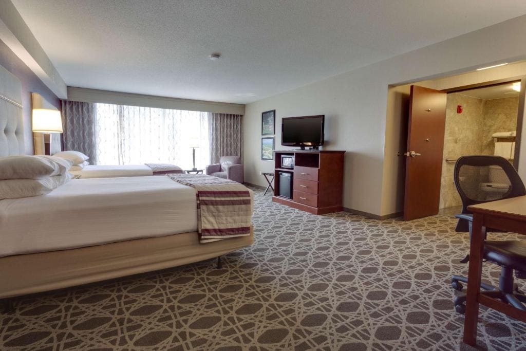 Deluxe Queen Room with Two Queen Beds room - Image 1