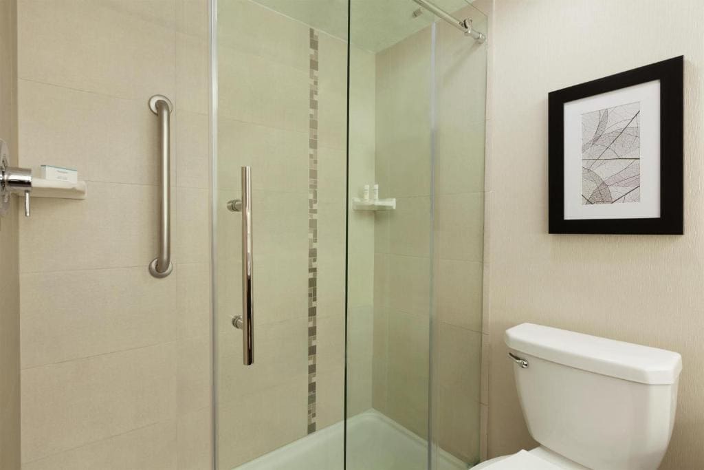 One King Bed Suite with Walk-In Shower room - Image 1